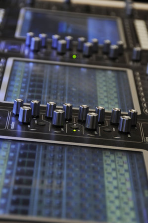 Audio mixing board with several channels and push sliding buttonsの写真素材