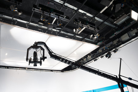 Television studio with jib camera and lights - camera on a crane