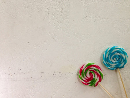 Lollipops on blank White wall