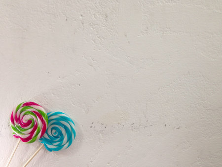 Lollipops on blank White wall