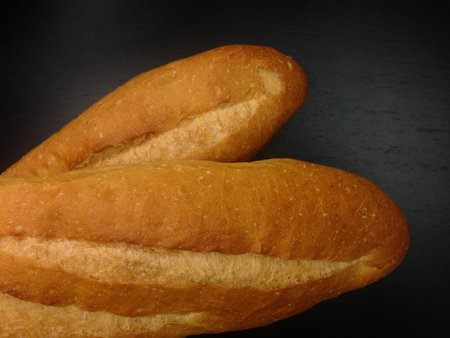 Bakery Bread of Baguette on black background