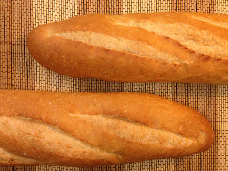 Bakery Bread of Baguette on  a Wooden Table.の写真素材