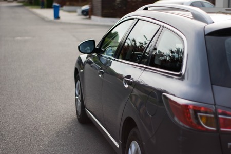Modern Car on the Street Side Viewの写真素材