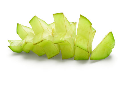 Sliced fresh star fruit arranged on white backgroundの写真素材