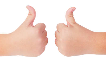 Kid's hands, left and right, showing thumbs up gesture on white  backgroundの写真素材