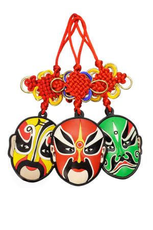 Colorful Chinese new year traditional opera mask ornaments on white backgroundの写真素材