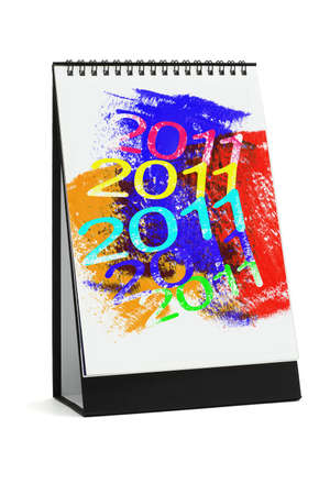 Desktop calendar with abstract artwork 2011 on white background の写真素材