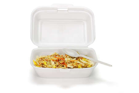 Fried rice in box with plastic disposable spoon on white backgroundの写真素材