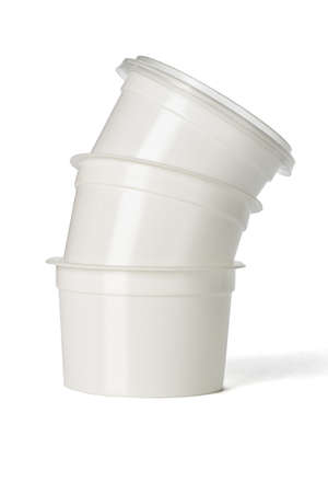 Stack of plastic containers on white backgroundの写真素材