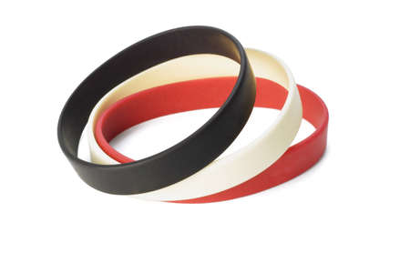 Colorful elastic wrist bands on white background の写真素材