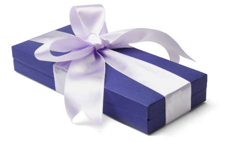 Blue gift box with big bow ribbon on white backgroundの写真素材