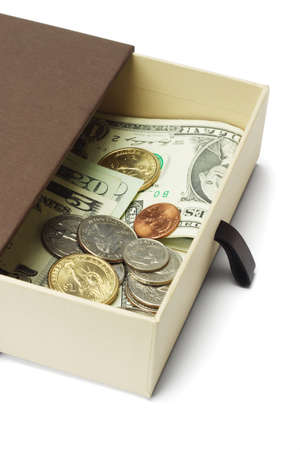 US dollar notes and coins in brown gift box on white backgroundの写真素材
