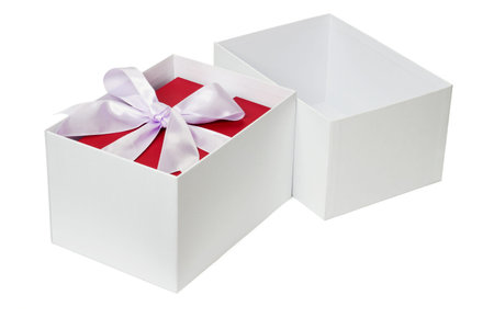 Red gift box with bow ribbon inside open white package