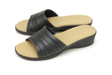 Black casual lady footwear on white background の写真素材