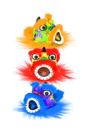 Chinese new year colorful lion head ornaments on whiteの写真素材