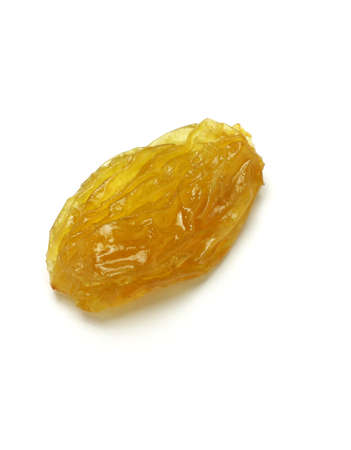 Golden jumbo size raisin on white backgroundの写真素材