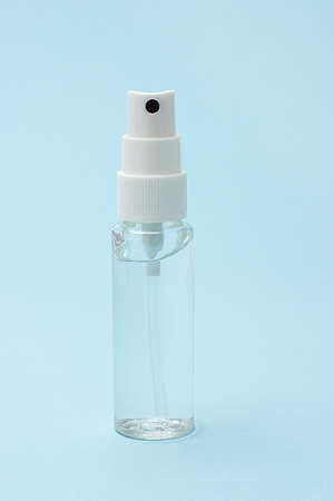 Hand sanitizer gel on seamless blue backgroundの写真素材