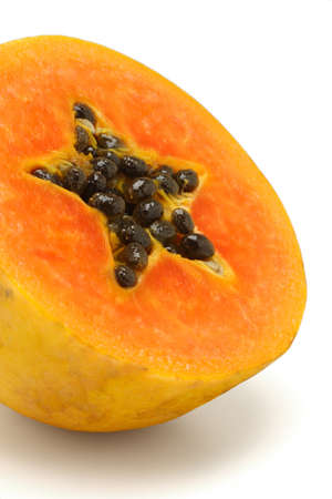 Cut juicy papaya fruit on white backgroundの写真素材