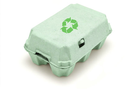 Egg paper carton with recycle symbol in green