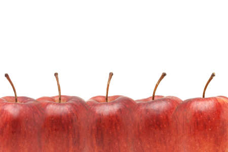 Superimposed Red apples border with copy space on white backgroundの写真素材