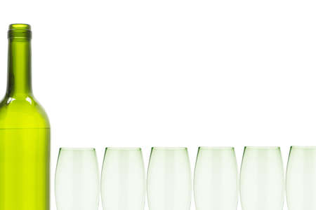 Wine bottle and glasses border with copy space on whiteの写真素材