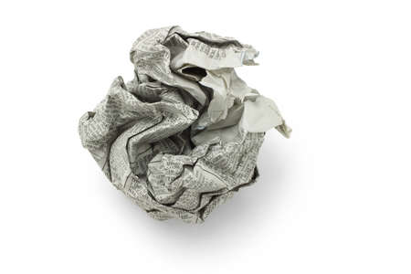 Crumpled newspaper in shape of ball on white backgroundの写真素材
