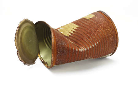 Old rusty crumbled tin can on white backgroundの写真素材
