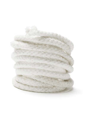 Coil of white rope on isolated backgroundの写真素材