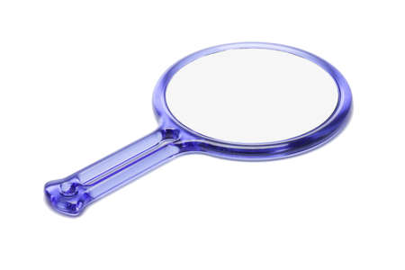 Blue plastic hand mirror on white backgroundの写真素材