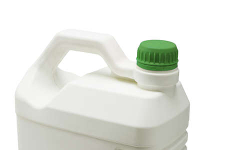 Close up of plastic storage container with green cap on white backgroundの写真素材
