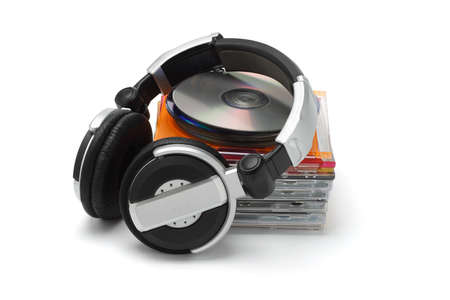Stereo headphone and compact dics on white backgroundの写真素材