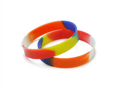 Multicolor rubber wrist bands on white backgroundの写真素材