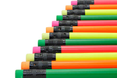 Colorful pencils arranged diagonally on white backgroundの写真素材