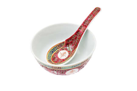 Top view of Chinese ceramic bowl and spoon with traditional design and Calligraphyの写真素材