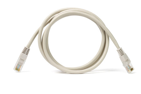 Close up of network cable and plugs on white background