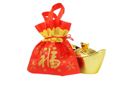 Chinese New Year Gift Bag and Gold inpgot Ornament on White Backgroundの写真素材