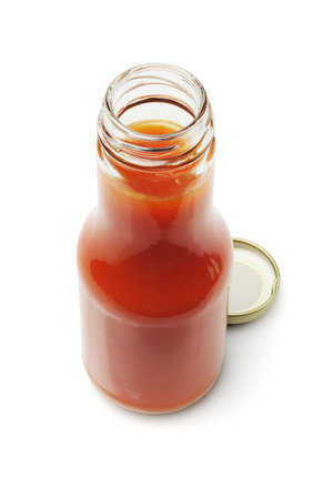 Open Bottle of Chili Sauce On White Backgroundの写真素材