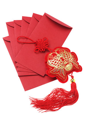Chinese New Year Red Packets and Auspicious Fish Ornamentの写真素材