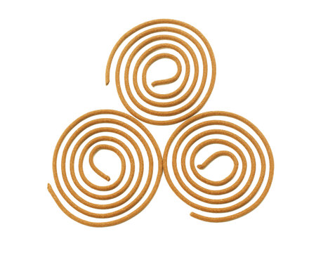 Three Oriental Praying Incense Coils on White Backgroundの写真素材