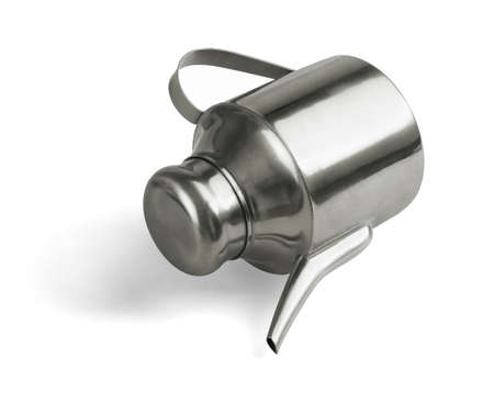 Metal Oil Decanter Lying on White Nackgroundの写真素材