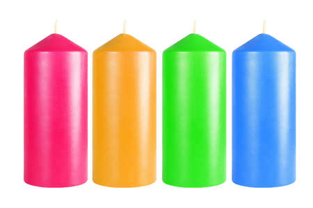 Row of Decorative Colourful Candles on White Backgroundの写真素材