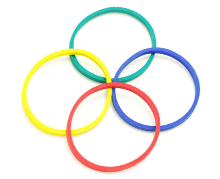 Colourful Rubbur Bands Arranged on White Backgroundの写真素材