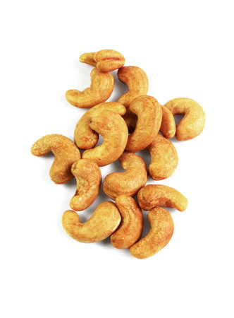 Roasted Cashew Nuts on White Backgroundの写真素材