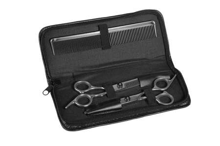 Hairdresser Tool Set in Open Bag on White Backgroundの写真素材