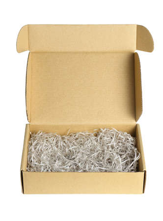 Shredded Papers in Brown Box on White Backgroundの写真素材