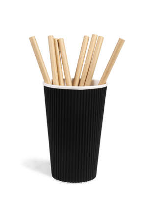 Brown Paper Straws in Black Cup on White Backgroundの写真素材