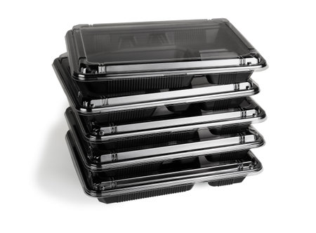 Stack of Black Plastic Takeaway Containers on White Backgroundの写真素材