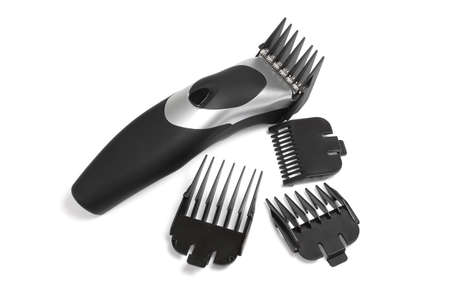 Electic Hair Trimmer and Assorted Plastic Combs on White Backgroundの写真素材