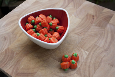 orange pumpkins Halloween candyの写真素材