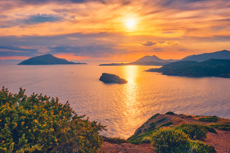 Aegean Sea with Greek islands view on sunset. Cape Sounion, Greece